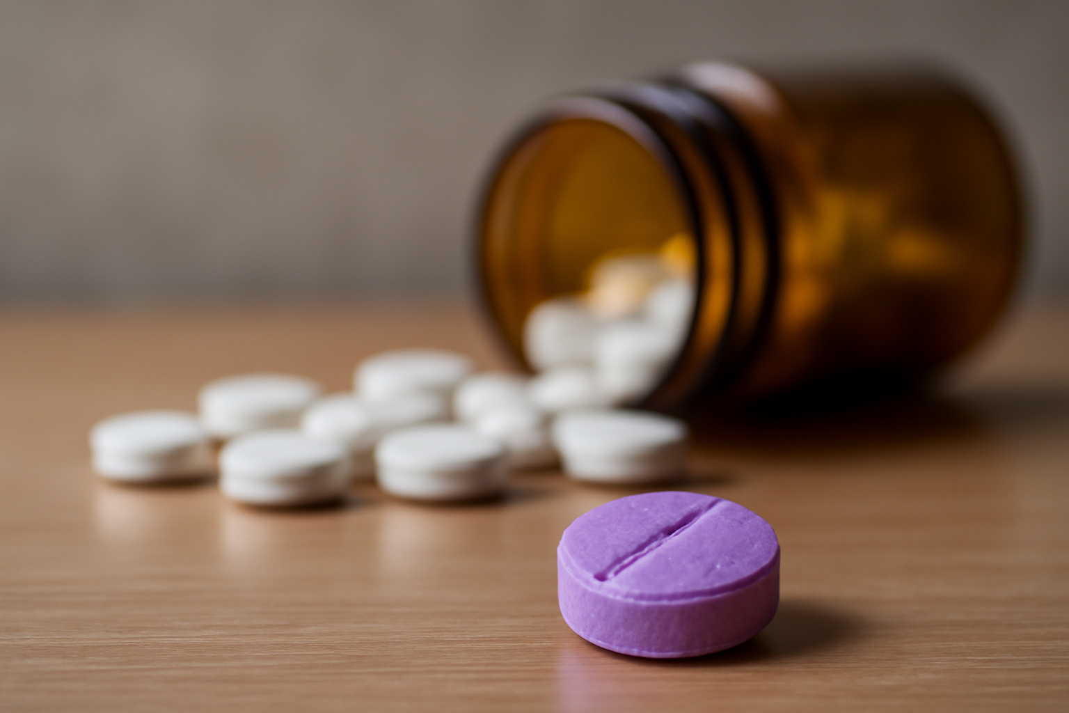 Chlorpromazine bottle with pills beside a dosing chart and patient information card.
